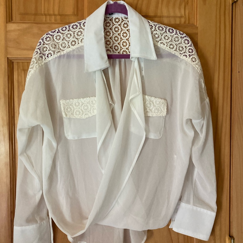 XOXO Size M see through long sleeve criss cross high low blouse